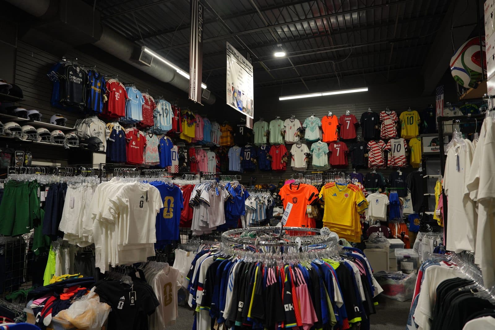 Wall of World Cup national team jerseys at Not Just Soccer